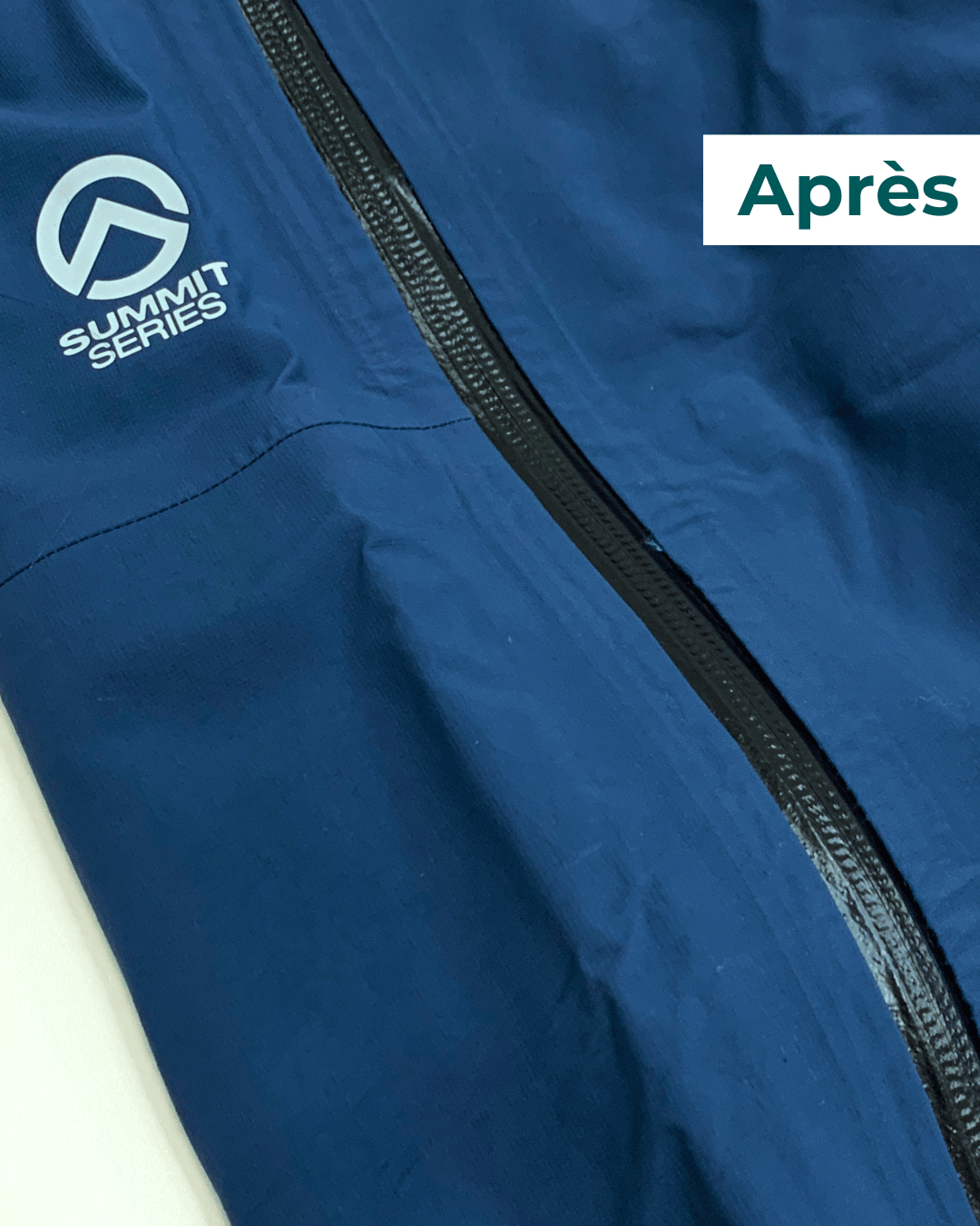 Remplacement complet d'une fermeture éclair sur le côté d'une veste technique après réparation.