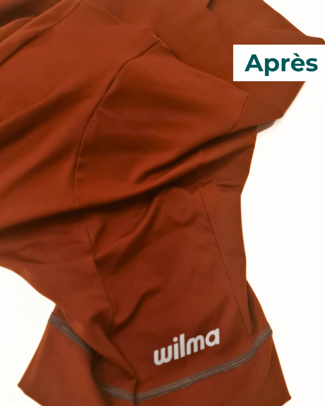 Cycliste Wilma rose réparé sur le côté, couture invisible et solide après passage en atelier.