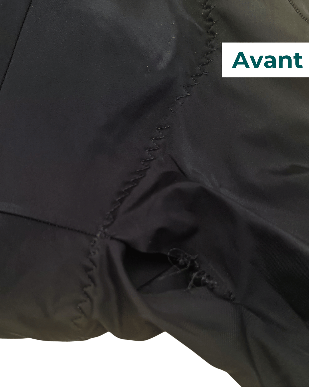 Short de cycliste noir décousu au niveau des entrejambes avant réparation.