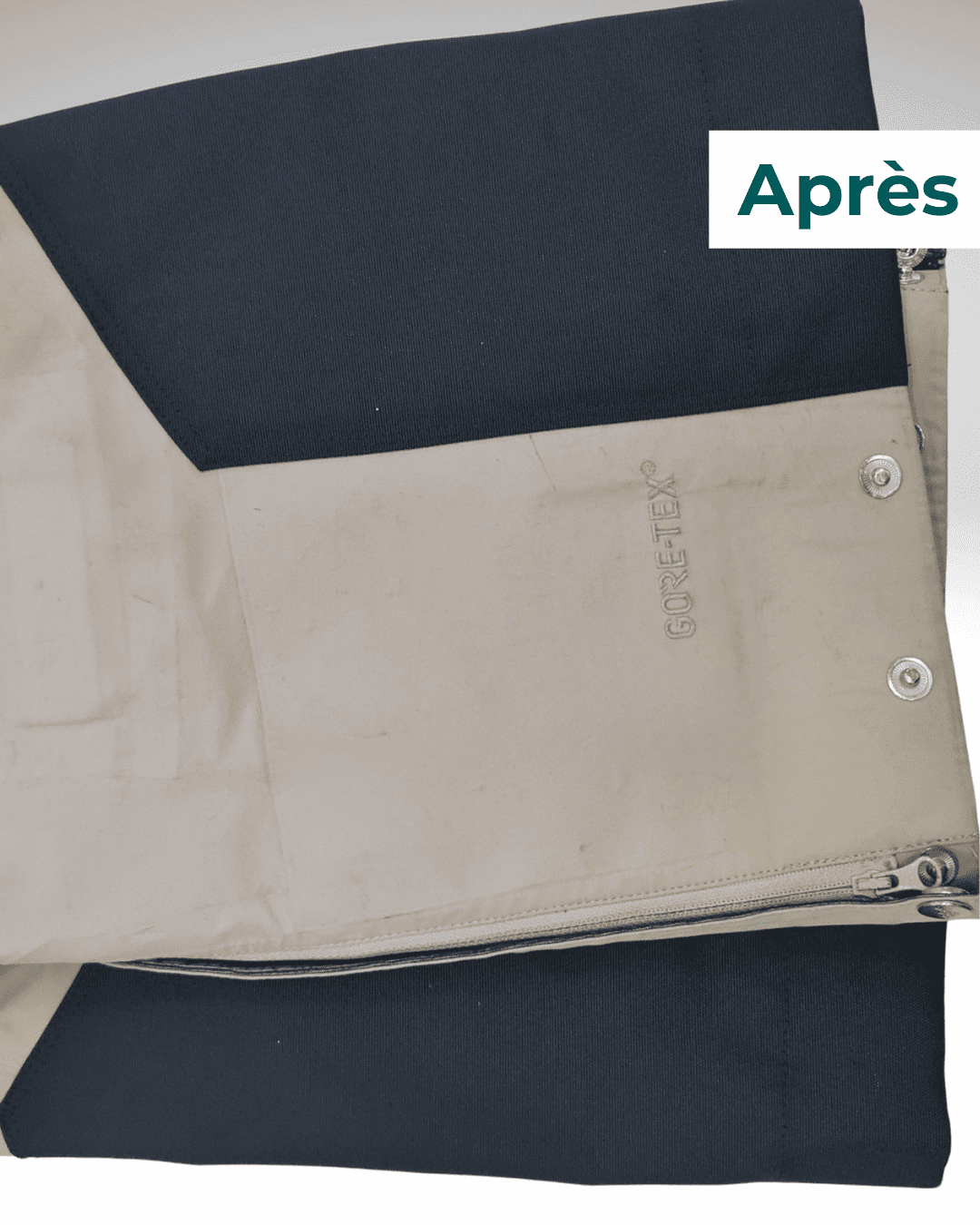 Nouveau protège-carre en Cordura noir robuste sur pantalon de ski Gore-Tex après réparation.